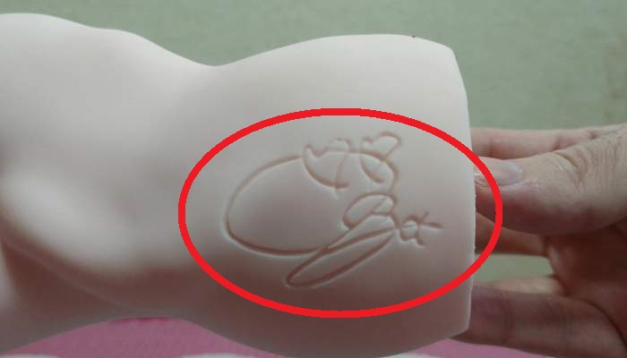 極選愛器 小倉由菜のサイン画像